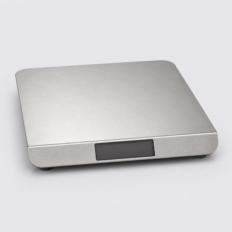 Wide brushed steel kitchen scale with a rectangular platform and a display along the front edge
