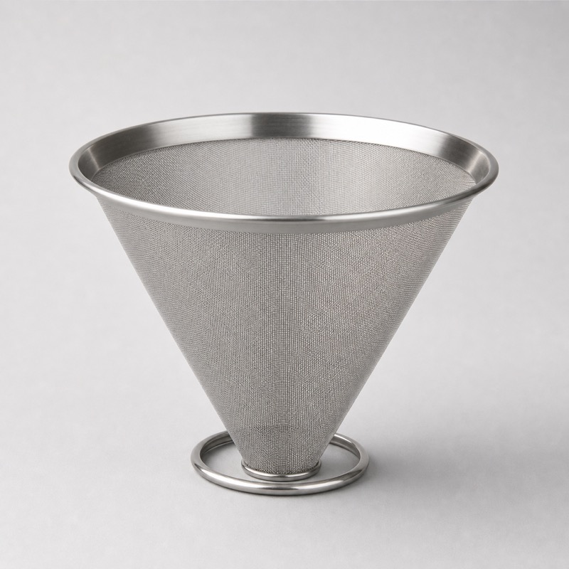 Cone-shaped stainless mesh coffee filter with a rolled rim, standing upright